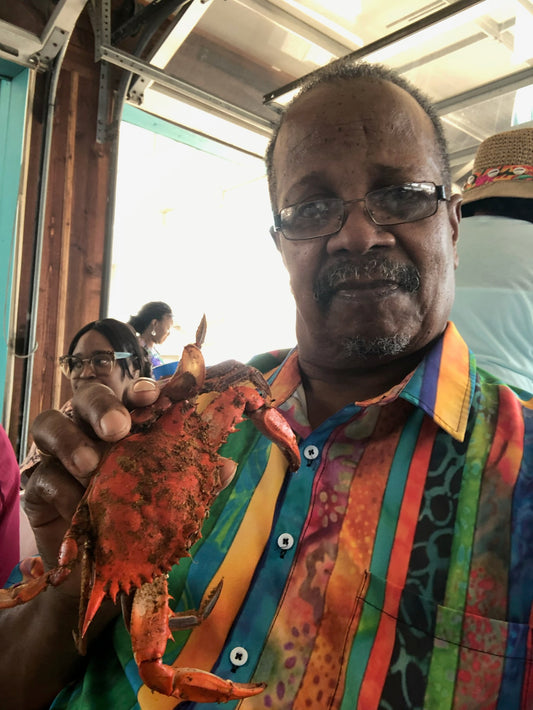 greg alston with a crab
