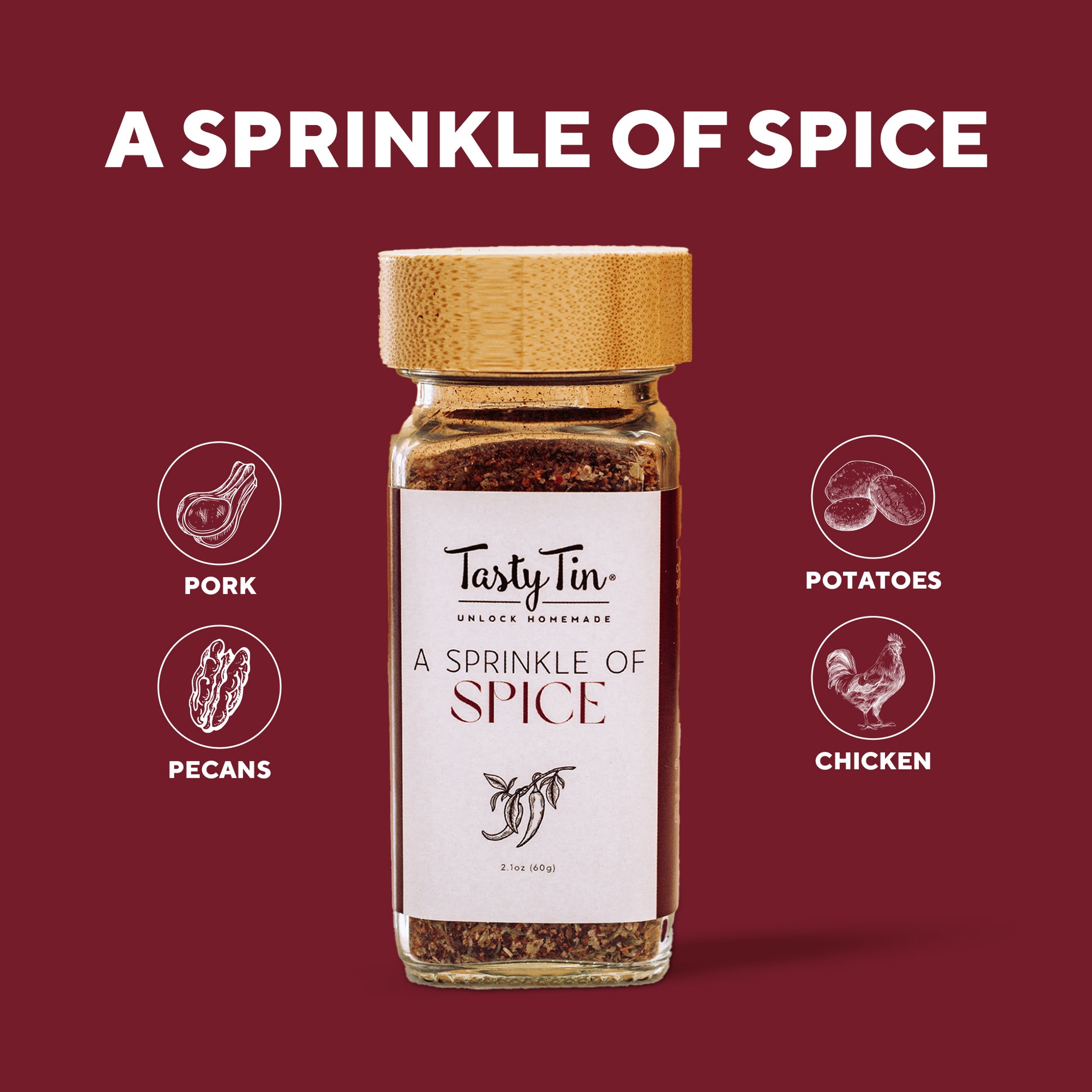 Tasty Tin gourmet spice shaker labeled A Sprinkle of Spice with bamboo lid on burgundy background